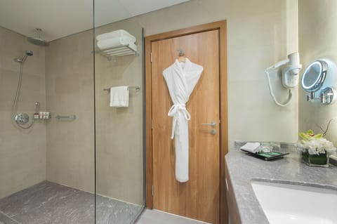 Shower, eco-friendly toiletries, hair dryer, towels