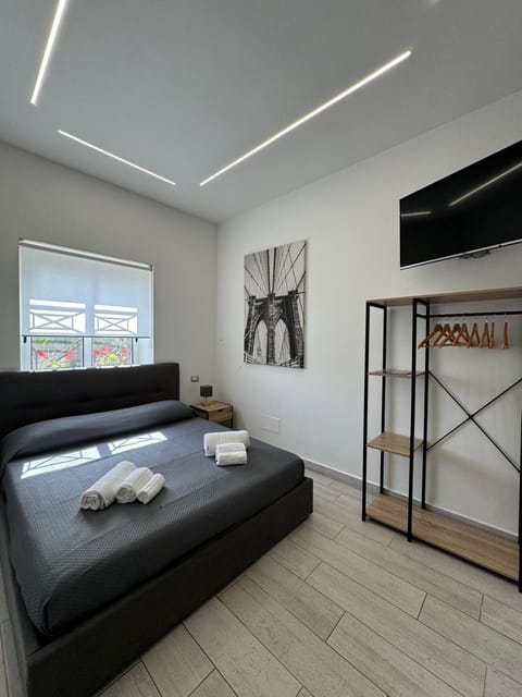 Luxury Quadruple Room | Premium bedding, individually decorated, desk, blackout drapes