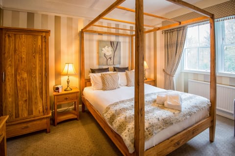 Four Poster Bedroom | Premium bedding, individually decorated, individually furnished