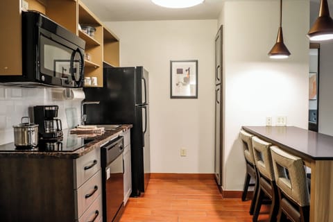 Suite, 1 Bedroom | Desk, blackout drapes, iron/ironing board, WiFi (free)