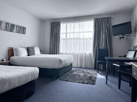 Premium bedding, in-room safe, individually decorated