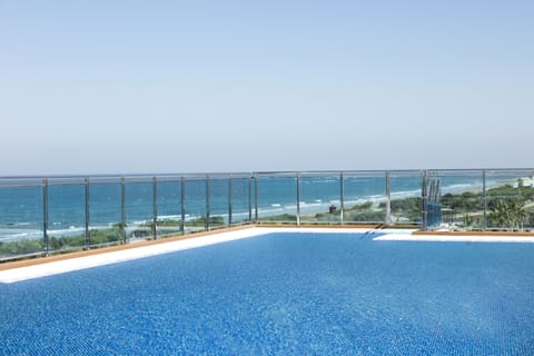 2 outdoor pools, pool umbrellas, sun loungers