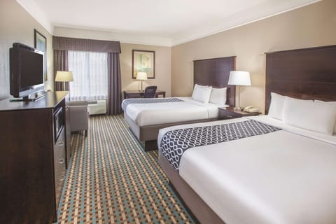 Premium bedding, desk, iron/ironing board, rollaway beds