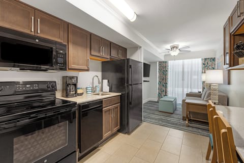 Microwave, stovetop, coffee/tea maker, cookware/dishes/utensils