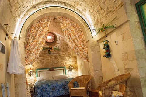 Luxury Suite, 1 King Bed, Private Bathroom | Frette Italian sheets, premium bedding, memory foam beds, minibar