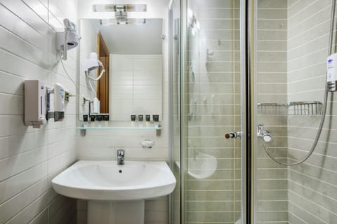 Shower, free toiletries, hair dryer, slippers