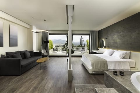 Panoramic Studio Suite, 1 King Bed | 1 bedroom, free minibar items, in-room safe, blackout drapes