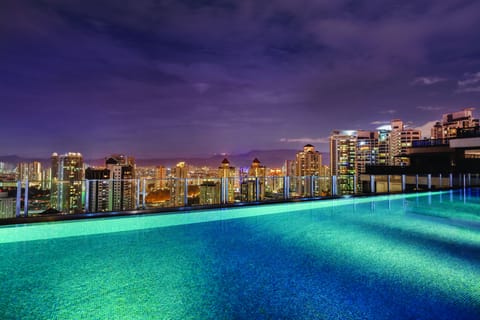 Outdoor pool, open 8:00 AM to 10:00 PM, sun loungers