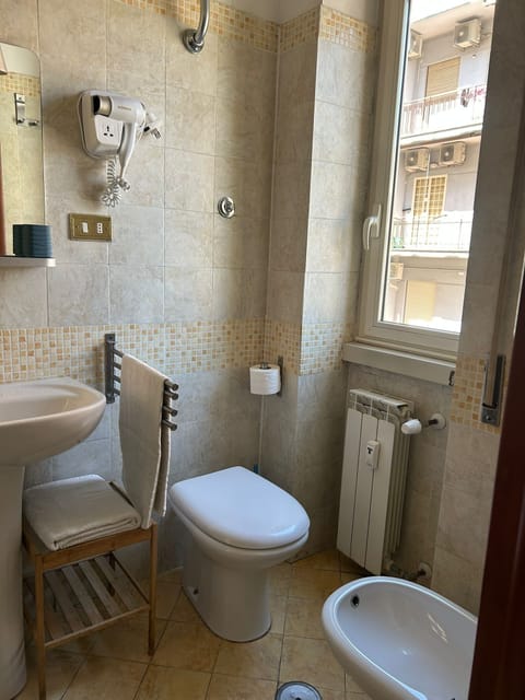 Standard Double Room, 1 Queen Bed | Bathroom | Shower, eco-friendly toiletries, hair dryer, bidet