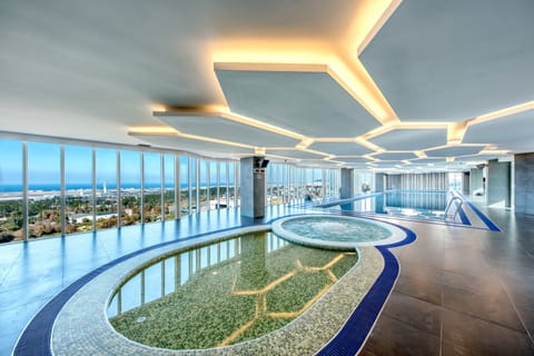 Indoor pool, open 7:00 AM to 9:00 PM, sun loungers