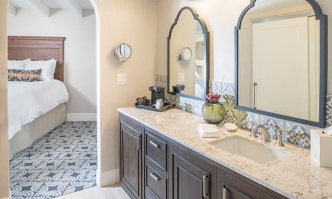 Designer toiletries, hair dryer, bathrobes, towels