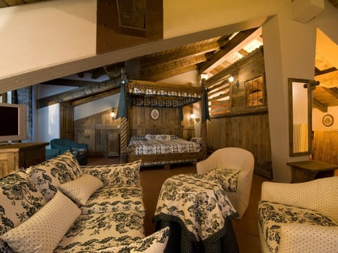 Superior Suite, 1 King Bed, Balcony, Mountain View | Living area | Flat-screen TV