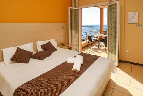 Panoramic Double Room, Balcony, Sea View | Minibar, desk, soundproofing, iron/ironing board