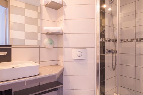 Shower, free toiletries, hair dryer, towels