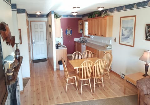 Fridge, microwave, coffee/tea maker, cookware/dishes/utensils