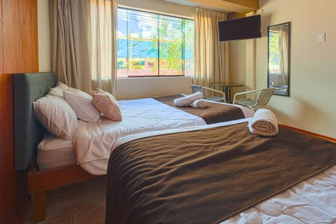 Family Double or Twin Room, Multiple Beds, Shared Bathroom | Hypo-allergenic bedding, down comforters, blackout drapes, free WiFi