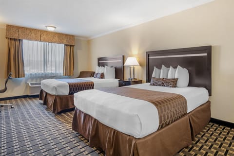 Standard Room, 2 Queen Beds, Non Smoking, Refrigerator & Microwave | Desk, laptop workspace, iron/ironing board, free internet