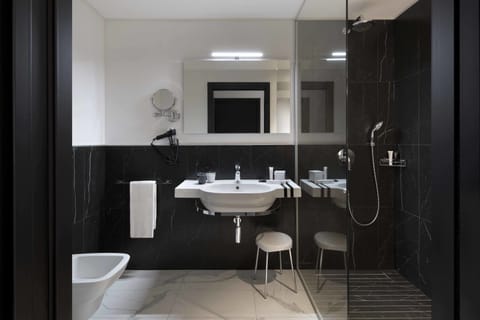 Shower, free toiletries, hair dryer, slippers