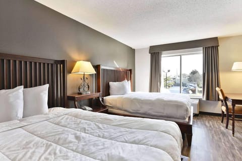 Deluxe Room, 2 Double Beds, Non Smoking | Frette Italian sheets, premium bedding, down comforters, pillowtop beds