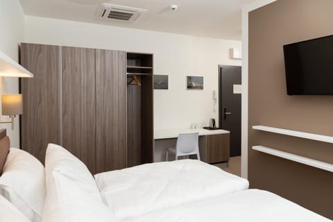 Premium bedding, in-room safe, soundproofing, iron/ironing board