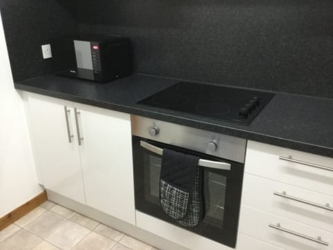 Apartment | Private kitchenette | Full-size fridge, microwave, oven, stovetop