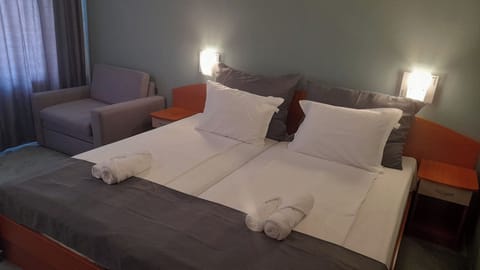 Desk, iron/ironing board, free WiFi, bed sheets