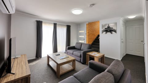 Apartment, 2 Bedrooms (2 storey with balcony) | Living area | 47-inch Smart TV with cable channels, TV