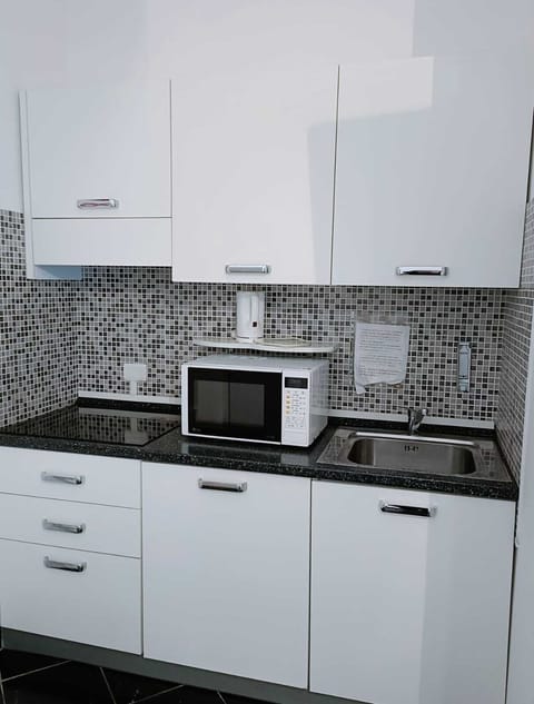 Superior Quadruple Room, Kitchenette | In-room safe, soundproofing, free WiFi, bed sheets