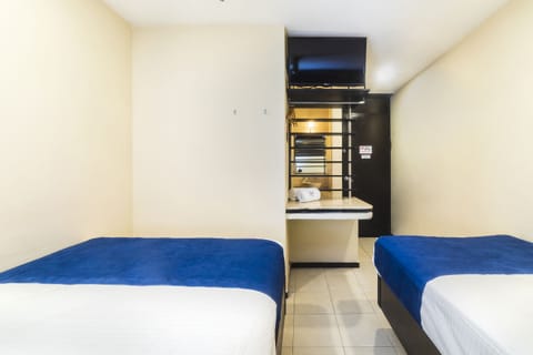 Triple Room | Desk, laptop workspace, iron/ironing board, free cribs/infant beds