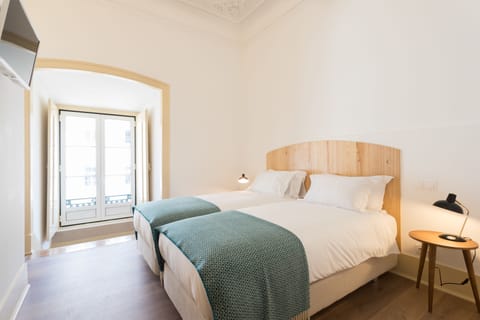 Junior Suite | Blackout drapes, iron/ironing board, free cribs/infant beds, free WiFi