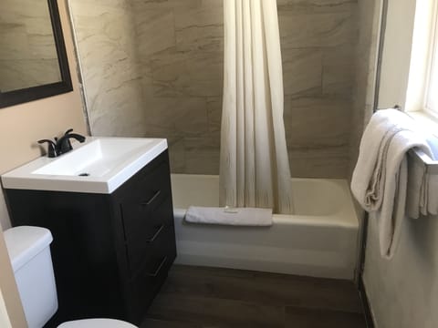 Suite, Accessible, Refrigerator & Microwave | Bathroom | Eco-friendly toiletries, hair dryer, towels