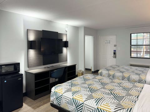 Premium bedding, desk, blackout drapes, iron/ironing board