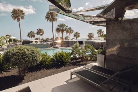 Junior Suite, Pool View (2 adults) | Terrace/patio