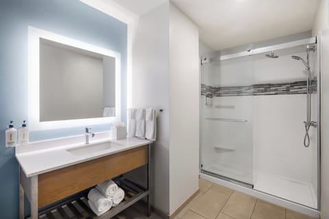 Designer toiletries, hair dryer, towels, soap