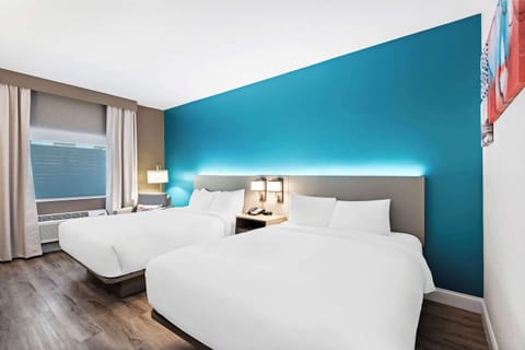 Room, 2 Queen Beds, Non Smoking | In-room safe, laptop workspace, blackout drapes, iron/ironing board