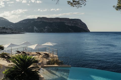 2 outdoor pools, open 9:00 AM to 8:00 PM, pool umbrellas, sun loungers