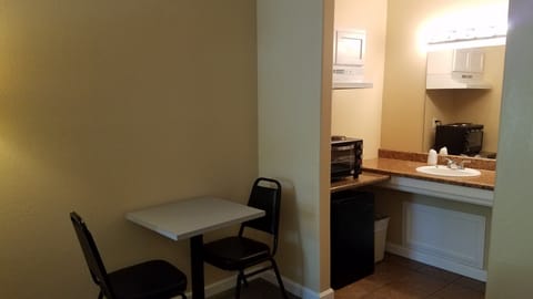 Deluxe Room, 2 Double Beds, Kitchenette, Ground Floor | Premium bedding, desk, free WiFi, bed sheets