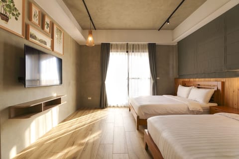 Signature Quadruple Room, 2 Double Beds, Ocean View | Down comforters, individually furnished, desk, blackout drapes