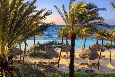 Private beach, white sand, sun loungers, beach umbrellas