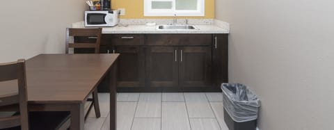 Suite, 2 Queen Beds, Non Smoking | Private kitchen | Fridge, microwave