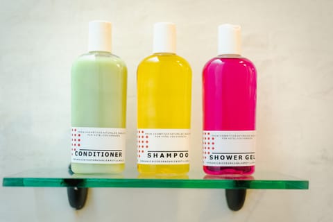 Shower, eco-friendly toiletries, hair dryer, towels