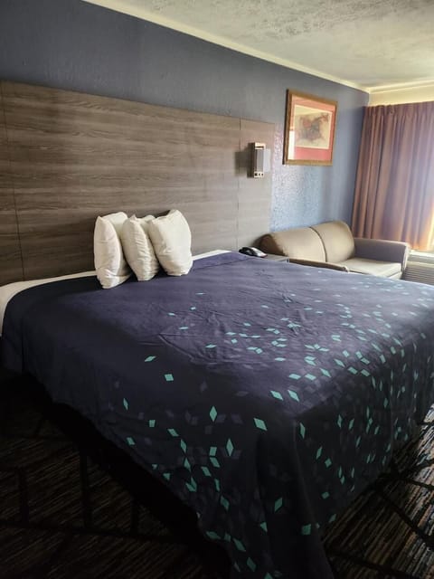 Blackout drapes, iron/ironing board, free WiFi, bed sheets