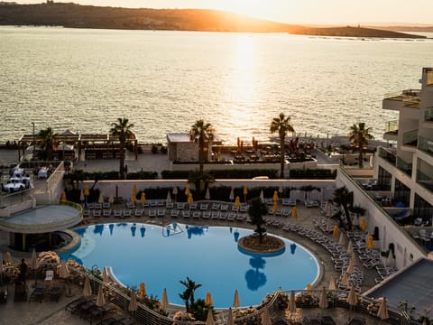 Indoor pool, 2 outdoor pools, pool umbrellas, sun loungers