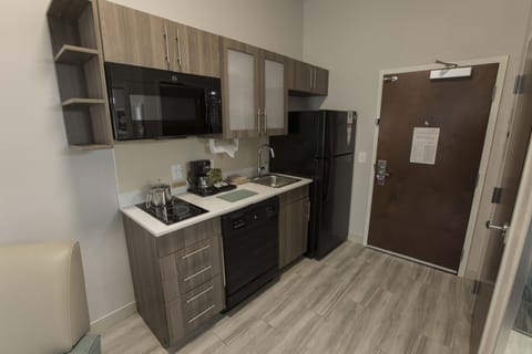 Premium bedding, desk, laptop workspace, iron/ironing board