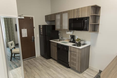 Premium bedding, desk, laptop workspace, iron/ironing board