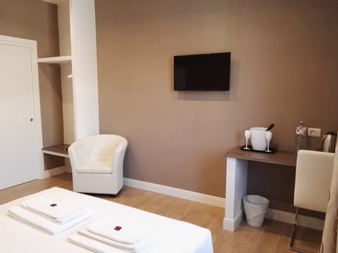 Desk, rollaway beds, free WiFi, bed sheets