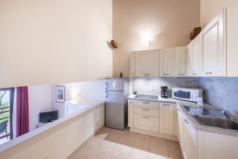 Superior Apartment, 2 Bedrooms, Terrace, Lake View | Private kitchen | Full-size fridge, oven, cookware/dishes/utensils