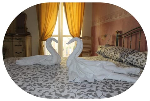 Desk, iron/ironing board, free cribs/infant beds, free WiFi