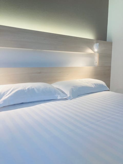 Superior Double Room | Desk, laptop workspace, blackout drapes, iron/ironing board