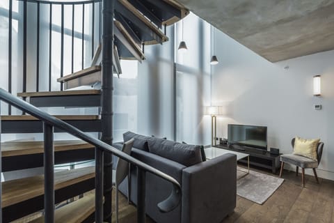 Apartment, 1 Bedroom | Living area | 32-inch flat-screen TV with satellite channels, TV